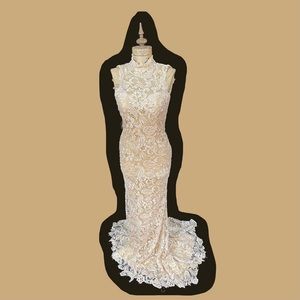 Terrani couture gold lacy gown. Worn a few times but in immaculate condition.